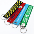 Promotional Wholesale Custom Brand Name Travel Souvenir Woven Embroidery Logo Fabric Keychains